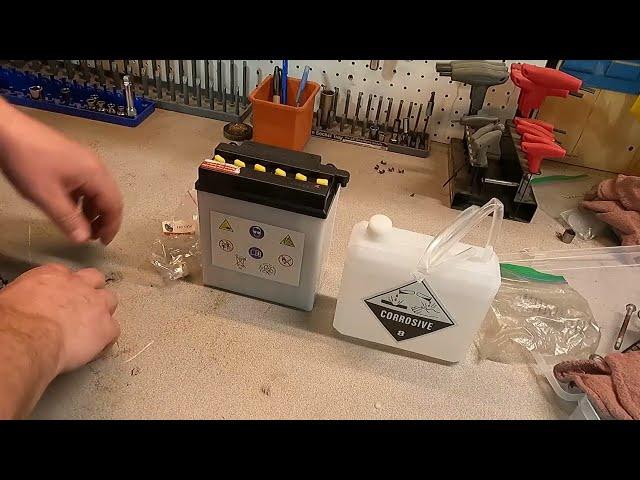 How to prepare a new motorcycle battery with acid.