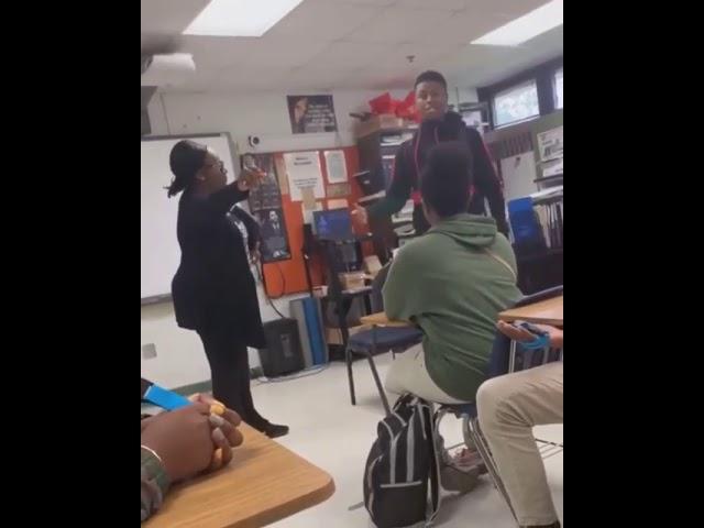 Student snatch teacher wig off in class