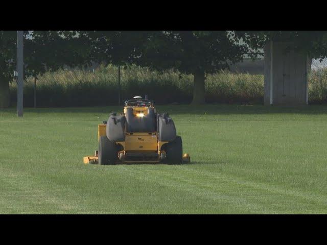 Riderless mower cutting lawns and turning heads in Ravenna