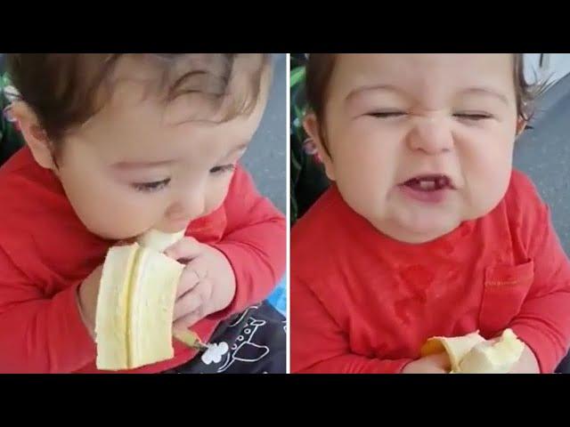 Cutest baby boy ever chows down on tasty banana