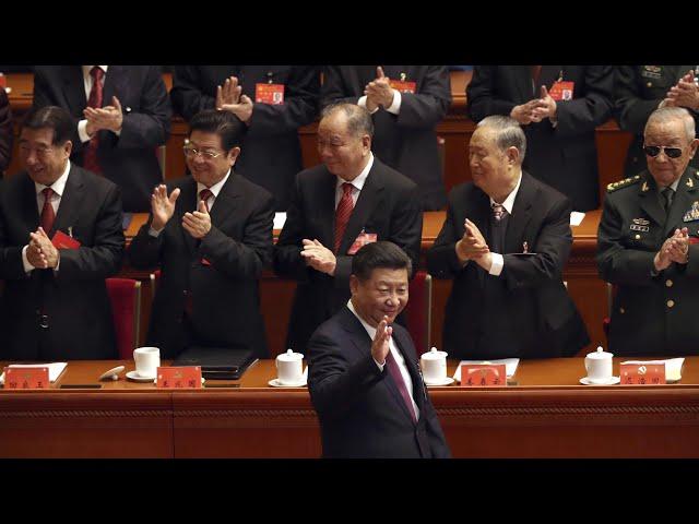 Delegates clap and sing as Xi Jinping opens Communist party congress