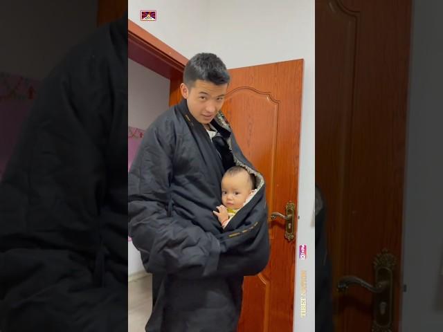 Tibetan young father carrying a baby.  #tibetan #youngdad #fatherlove #babyreels  #fatherdaughter