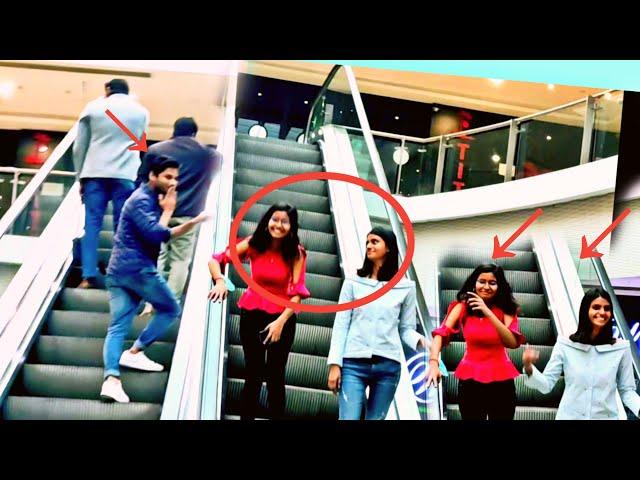 Giving flying kiss to strangers on escalator prank ! Ram Pranky