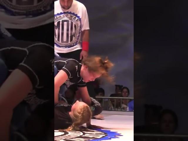 Foot on face in grappling girls