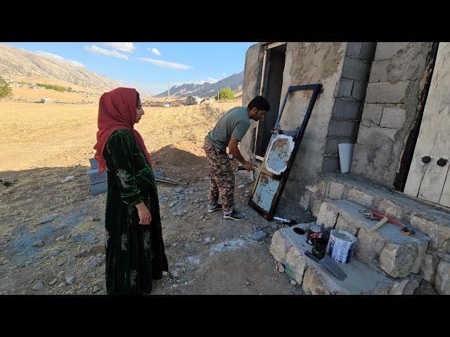 Shawkat's trip to the city for the baby's health: buying an iron door and helping Ali cover the roof