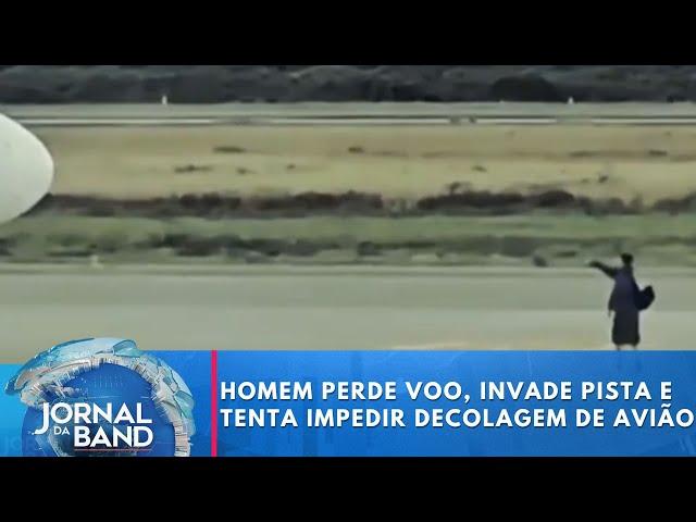 Homem perde voo, invade pista e tenta impedir decolagem de avião | Jornal da Band