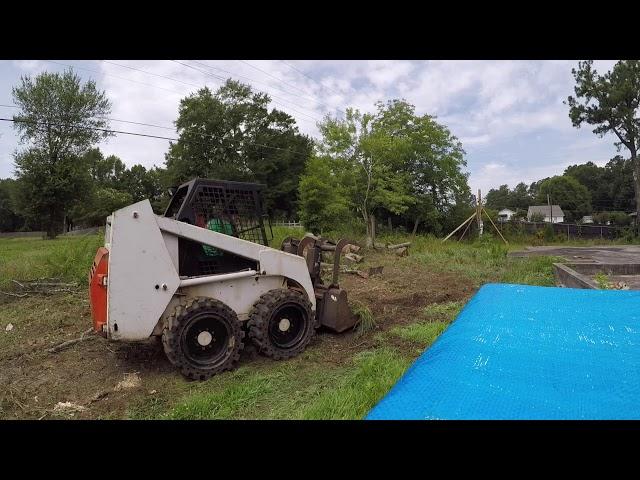 brush clean up in Powder Springs, GA. Bobcat skid steer service.