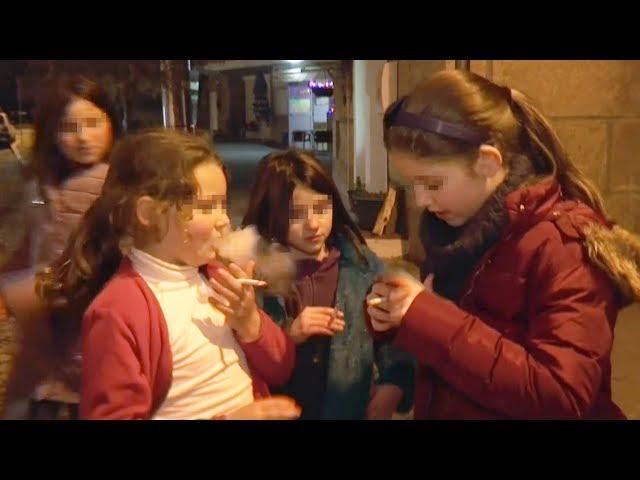 Parents encourage their children to smoke cigarettes in a Portuguese village