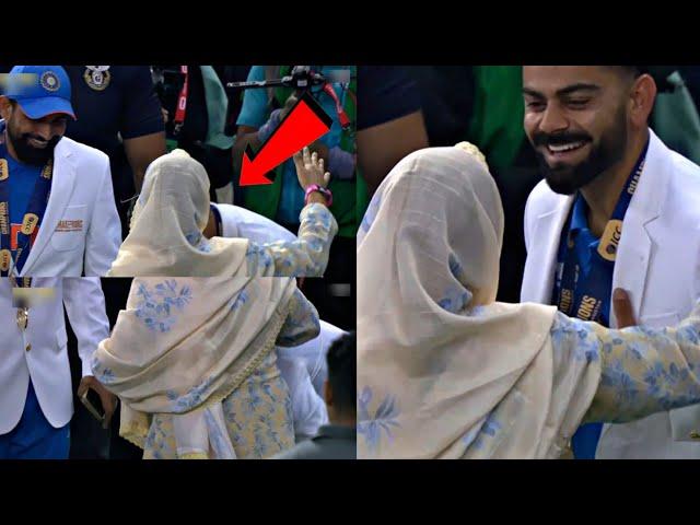 Virat Kohli touches Mohammad Shami's mothers feet after INDIA won the champions trophy final |