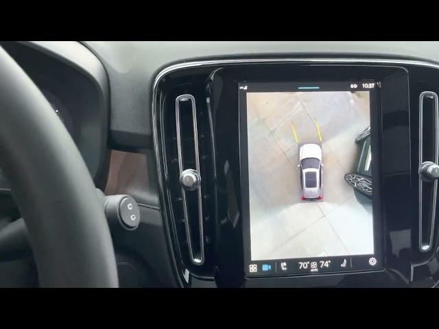 Volvo's updated 360° surround view camera in a parking lot at parking lot speeds