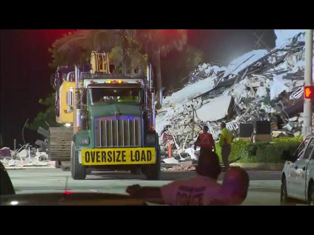 Rescue crews continue their search a day after Surfside building collapse