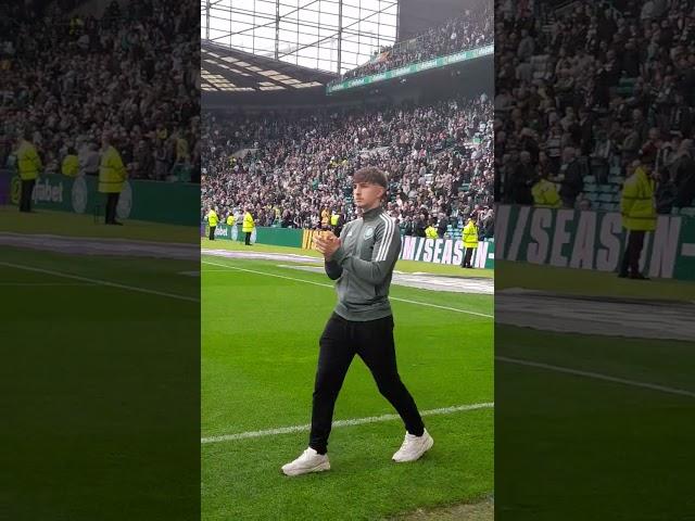 celtic under 18s and celtic B celebrate there victory over sevco with the fans