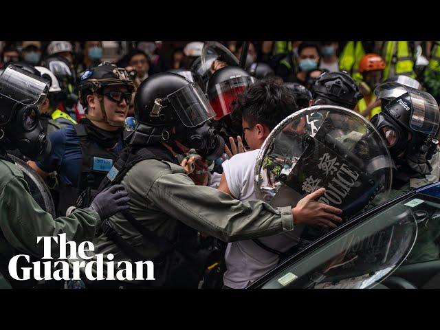 Police fire teargas as thousands rally against Beijing's national security law in Hong Kong