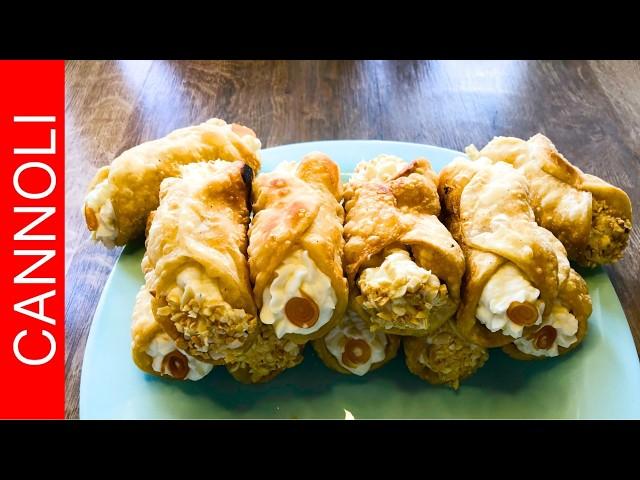 Cannoli - a famous Sicilian dessert filled with ricotta