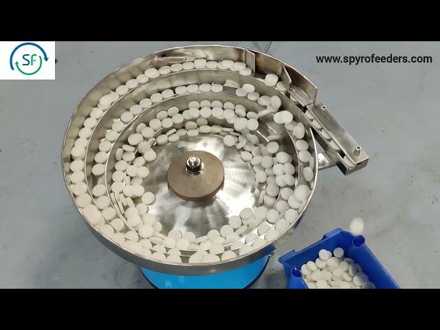 Vibratory bowl feeder for White foam plug component - Spyrofeeders