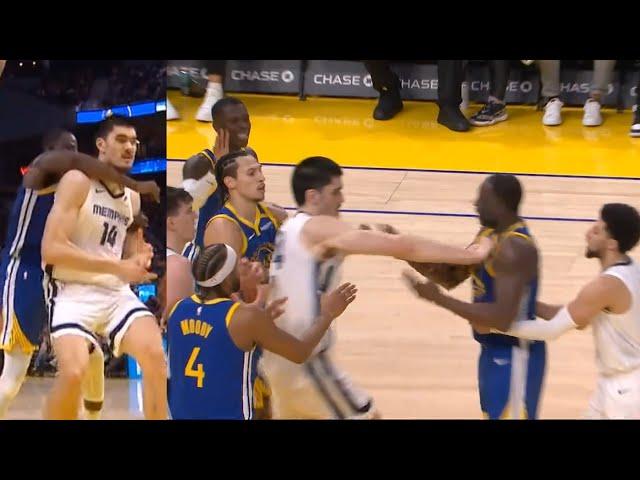 Zach Edey gets heated and shoves Draymond Green for flagrant 1 foul over shoulder