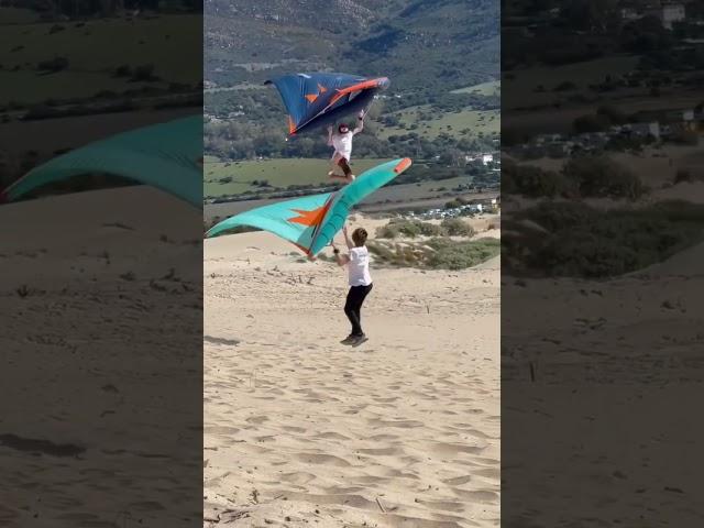 Kid flying away with a Wing 