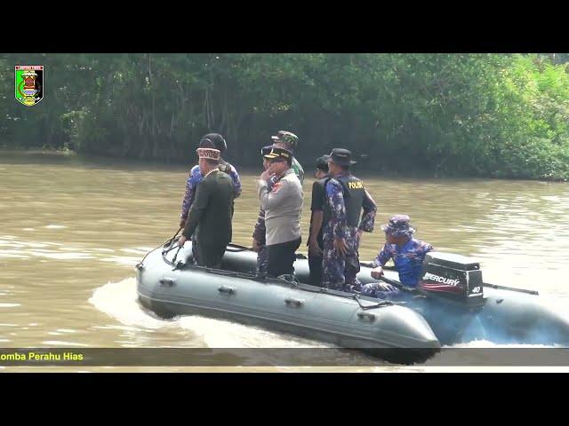 HUT BHAYANGKARA KE-77 DAN LOMBA PERAHU HIAS DI DESA MARGA SARI KUALA PENET KEC. LABUHAN MARINGGAI