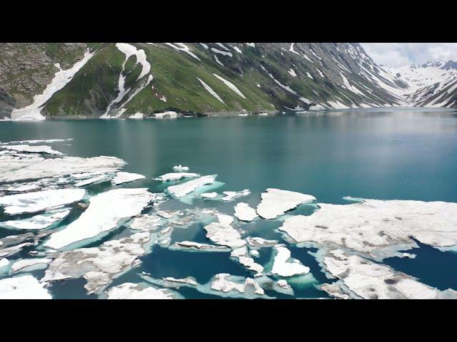 4K Scenery: Stunning Spring in the Cold glaciers melting Mountains green