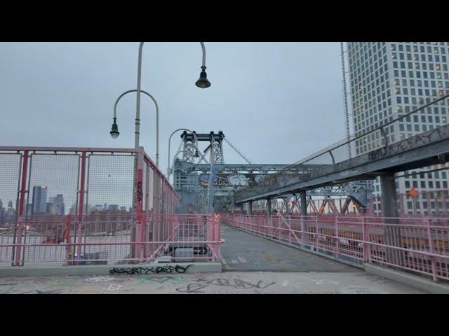 Walking over the Williamsburg Bridge in New York City 2024