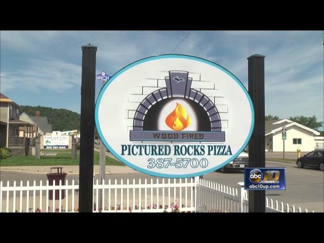 Organization thanks pizza place for fundraising help