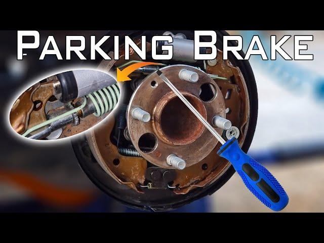 Car still moves with handbrake on/How to adjust Parking pedal brakes /Adjusting brake drum