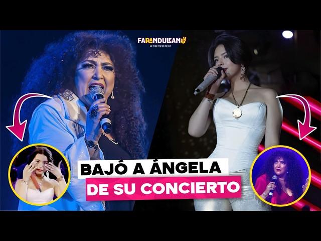 AMANDA MIGUEL BAJO A ÁNGELA AGUILAR DE SU ESCENARIO.