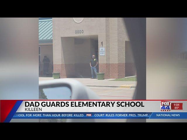 Dad Guards Elementary School