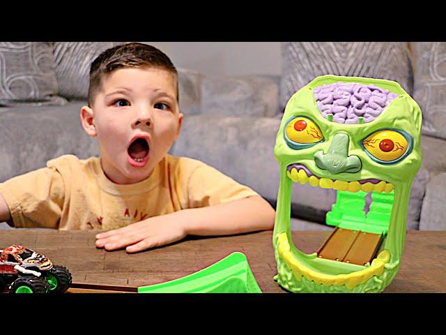 ZOMBIES in MY HOUSE! Caleb & Mommy Play with MONSTER JAM ZOMBIE RACE TRACK!