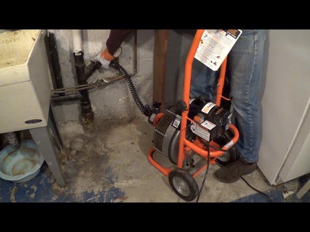 How to Unclog a Sewer Line with a Rented Drain Cleaner