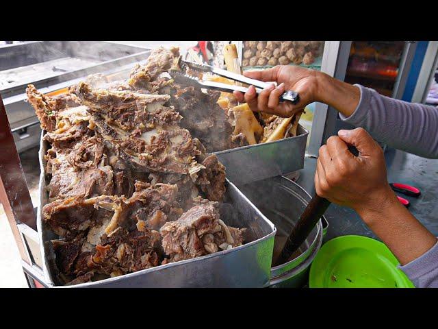 THE BEST BAKSO BALUNGAN IS STACKED UP ON THE ROAD SIDE, CHEAP PRICE, GUARANTEED SATISFACTION