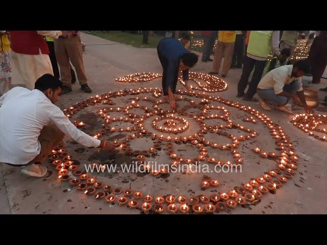 People of Delhi celebrate Deepotsav at Vasudev Ghat Rangoli designed with diyas New Delhi