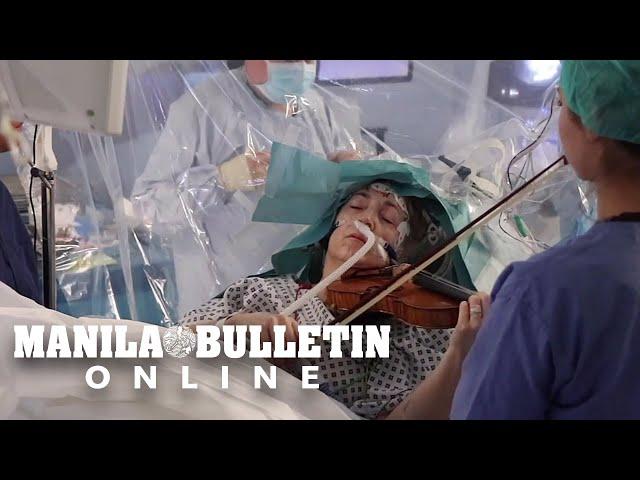 This woman incredibly plays violin during her brain  tumor surgery