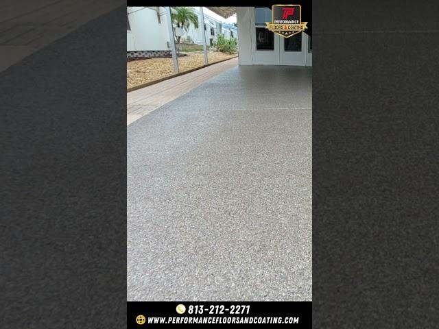 Revitalize your driveway with the stunning Garnet Flake Floor Coating! 