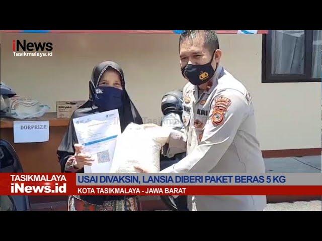 Vaksinasi Lansia, Polsek Tawang Berikan Beras 5 Kg dan Kompor Gas