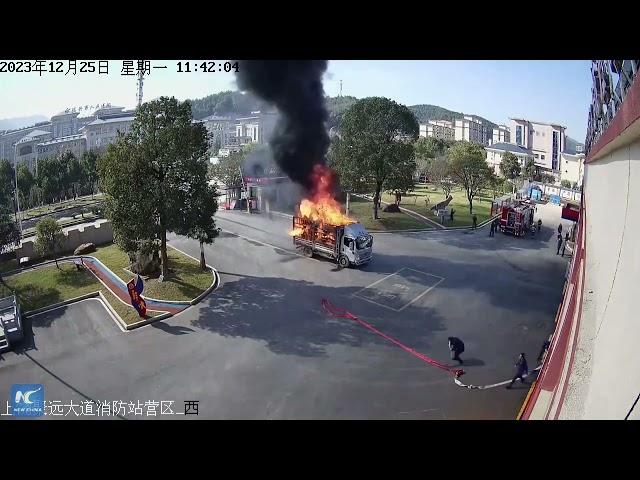 Quick-thinking driver races burning truck to fire station