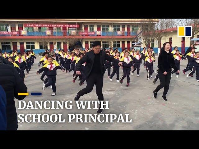 Chinese school principal teaches students shuffle dance during break