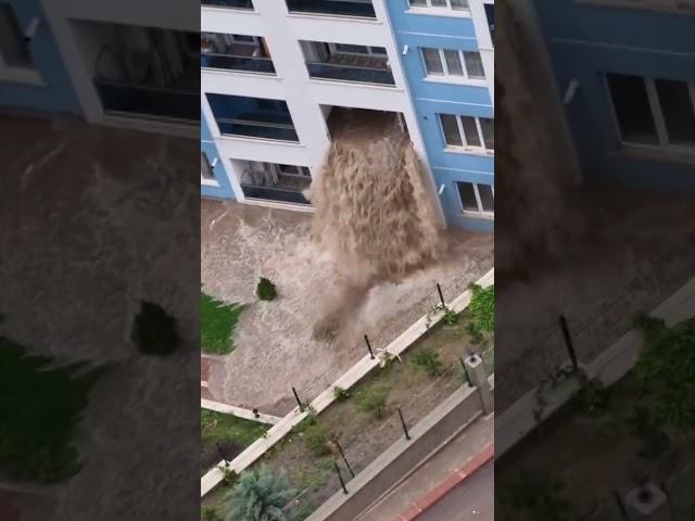 Flood waters gush through Ankara building