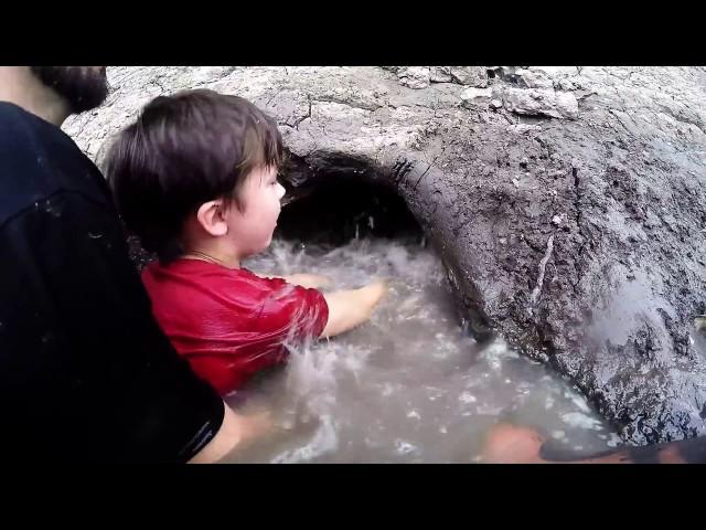 Noodling - Teaching 8yr old Son How to Noodle Catfish.  Catching Fish by Hand.