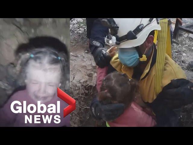 "I'm here, it's ok!": Emotional moment rescuers save little girl trapped in well in Aleppo