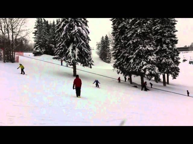 Michaela learning to snowboard