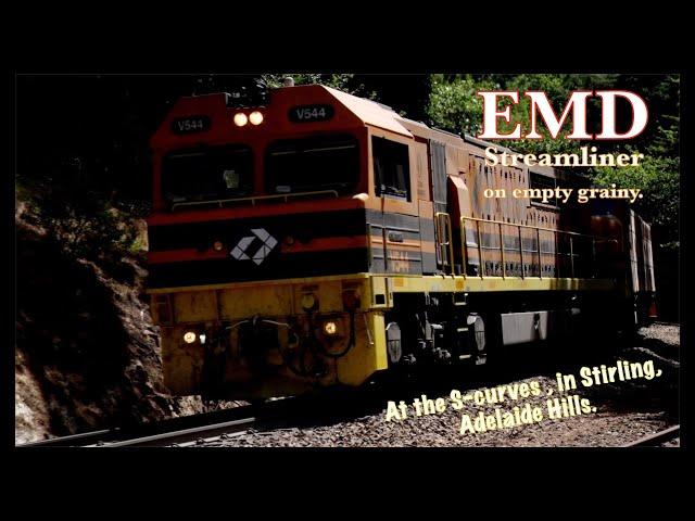 Empty Eastbound grain with EMD Streamliner.