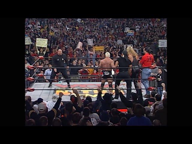 Goldberg confronts The nWo after the "Fingerpoke of Doom"