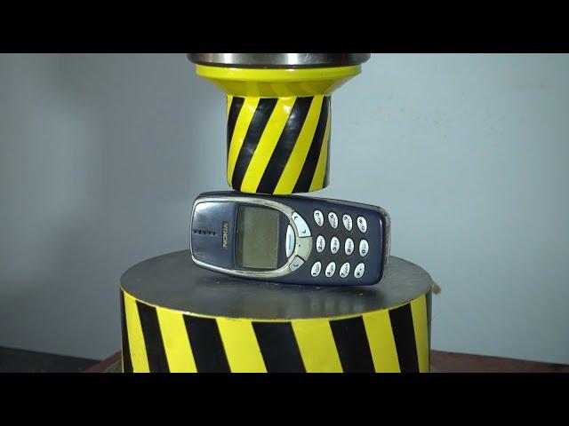 NOKIA 3310 BROKE 100 TON PRESS