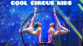 Cool circus kids.  Sluka Vaselina and Derko Maria - Gymnasts on a ground hoop.