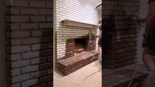 The results are in! We love our white painted fireplace! #DIY #paintsprayer #paintedbrick