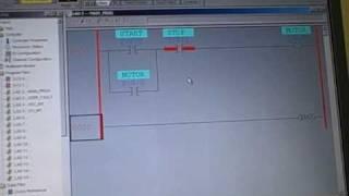 PLC programming -- motor start/stop function using "seal-in" contact