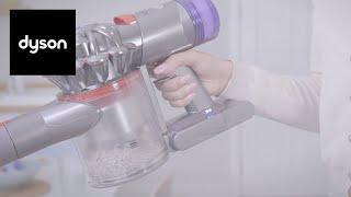 Dyson V8™ Slim cord-free vacuums. Emptying and cleaning the clear bin
