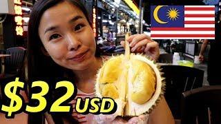Japanese girl is eating the most expensive durian "Black Thorn" in Penang