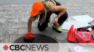 She uses manhole covers to create viral art and apparel